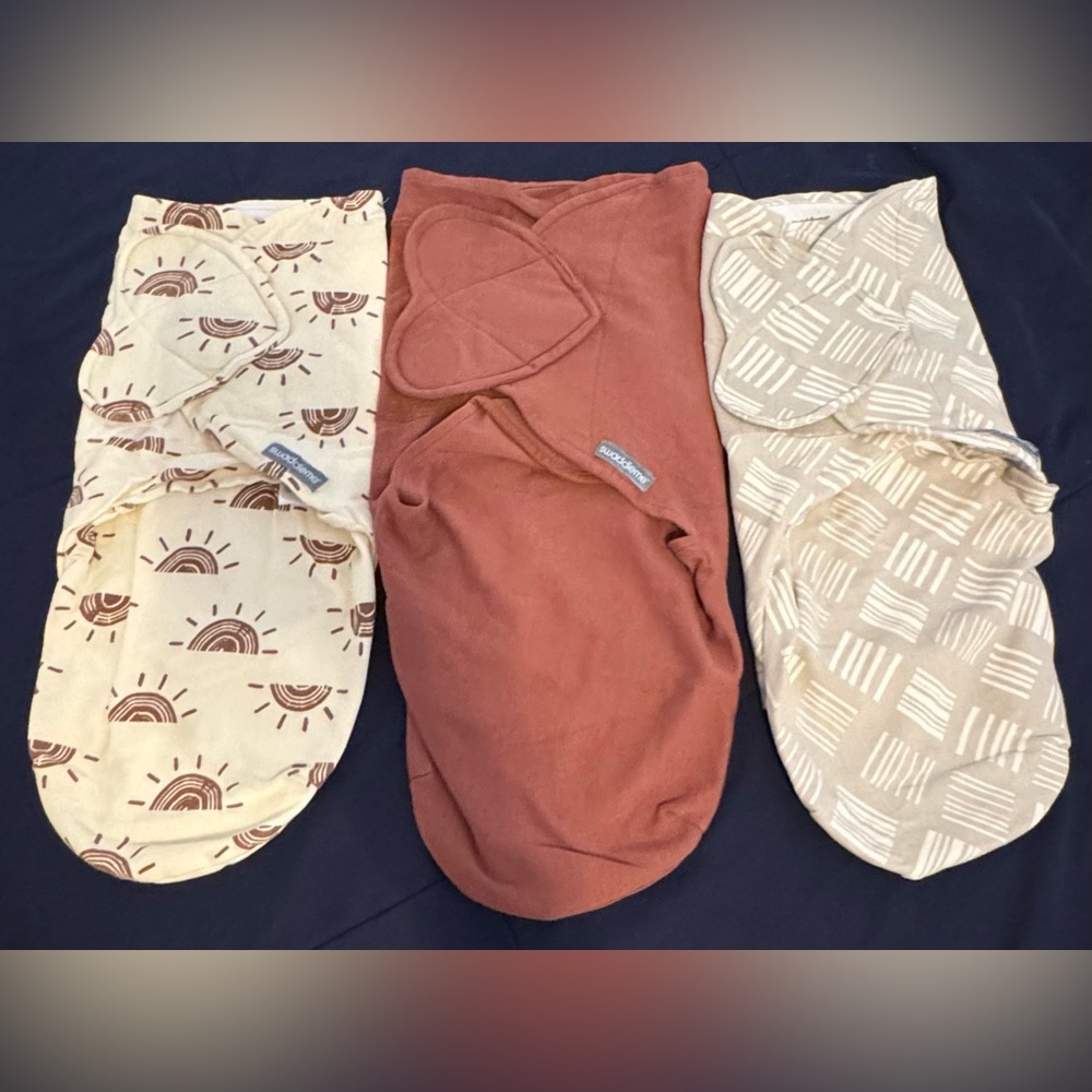 SwaddleMe Baby Swaddles in Cream, Brown, and Tan